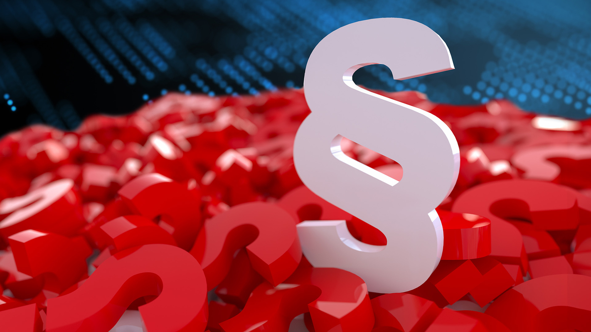 Weiße Paragraphen-Symbol steht auf bunten roten Fragezeichen, symbolisiert rechtliche Klarheit bei SHD.