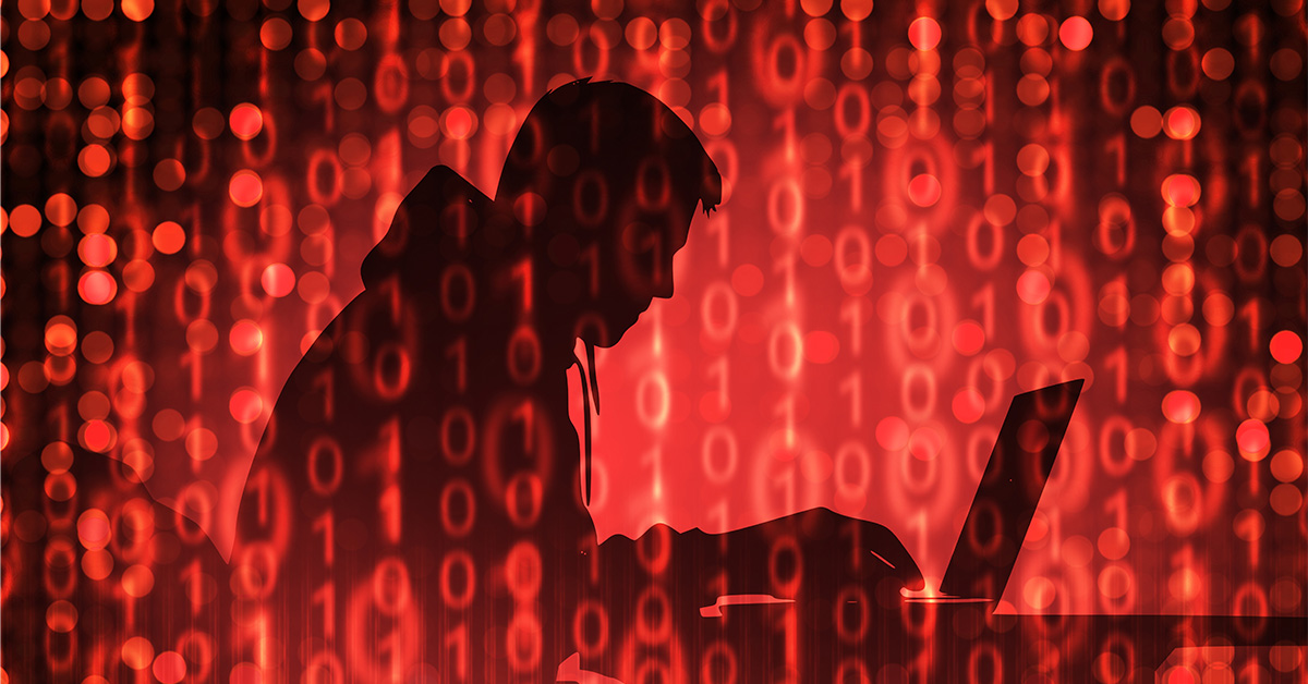 Ein Hacker im Schatten arbeitet an einem Laptop. Die Szene ist in Rot gehalten und wir von Binärcode überlagert, um das "Red Team" zu symbolisieren.